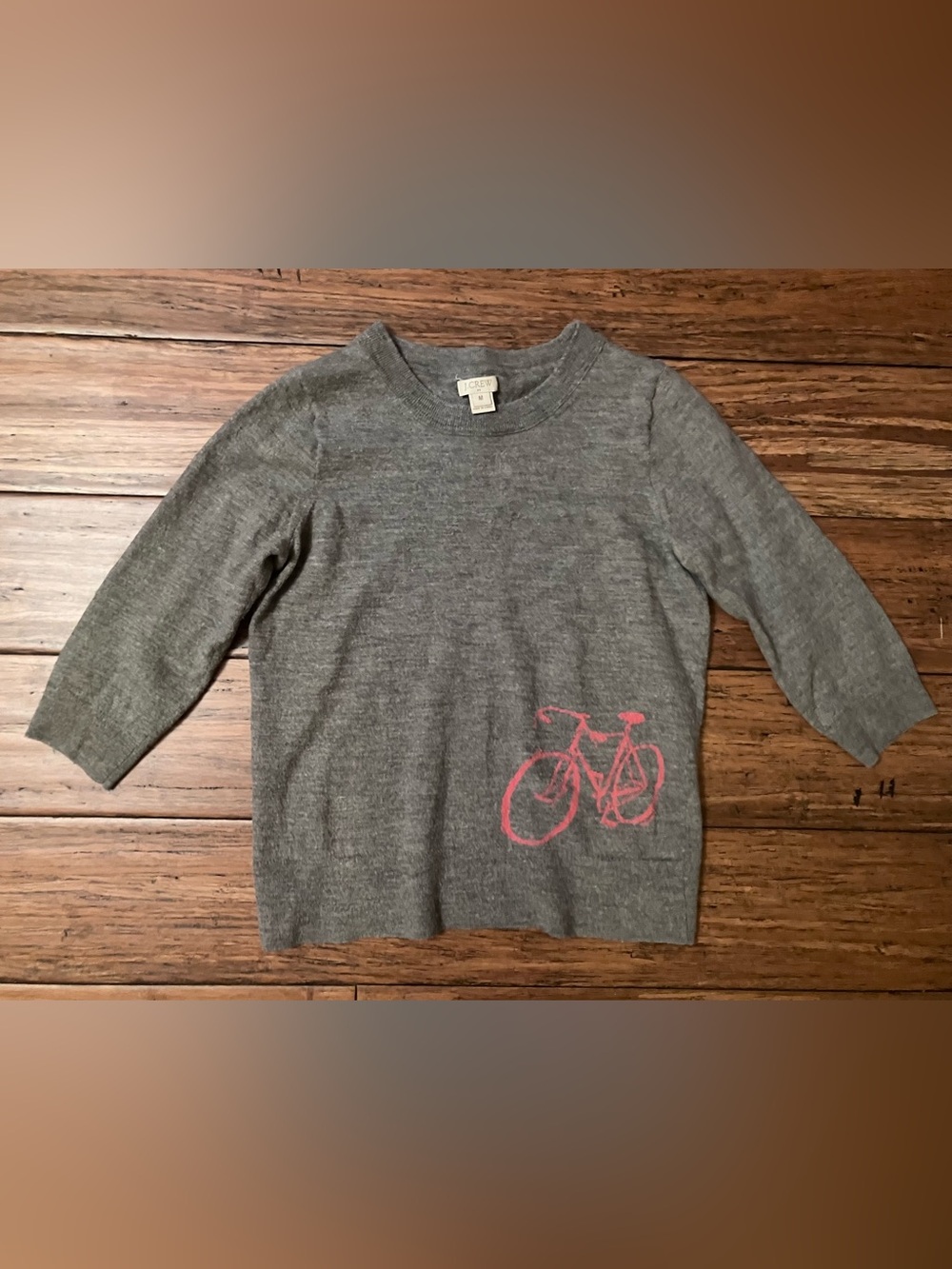 100% merino wool junior’s size small sweater with pink bike graphic